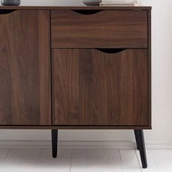 Mørteens Commode Gjora I - Partiellement en hévéa massif - Noyer 26 Mørteens Commode Gjora I - Partiellement en hévéa massif - Noyer -Meubles de salle à manger Soldes Magasin 1000123695 190325 11253100010 GALLERYIMAGES P000000001000123695